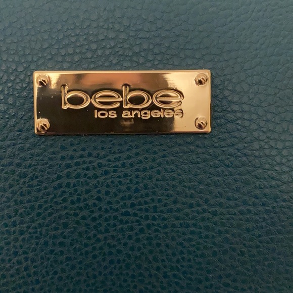 Bebe Los Angeles teal purse. Measures 14”x9”x4” with a 48” long and adjustable - Picture 3 of 6